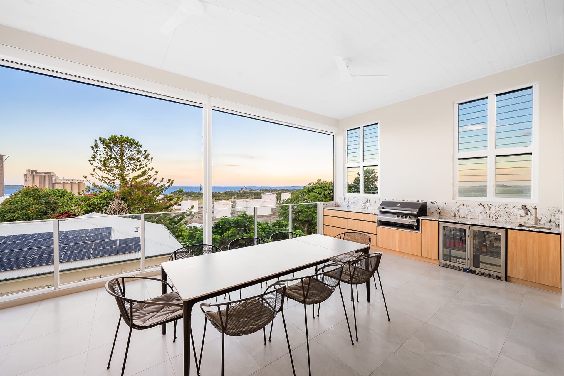 Outdoor entertaining area with BBQ kitchen and ocean views