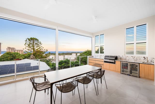 Outdoor entertaining area with BBQ kitchen and ocean views