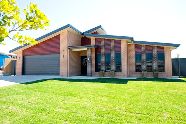 Modern Brick & Timber Home - Photo 1