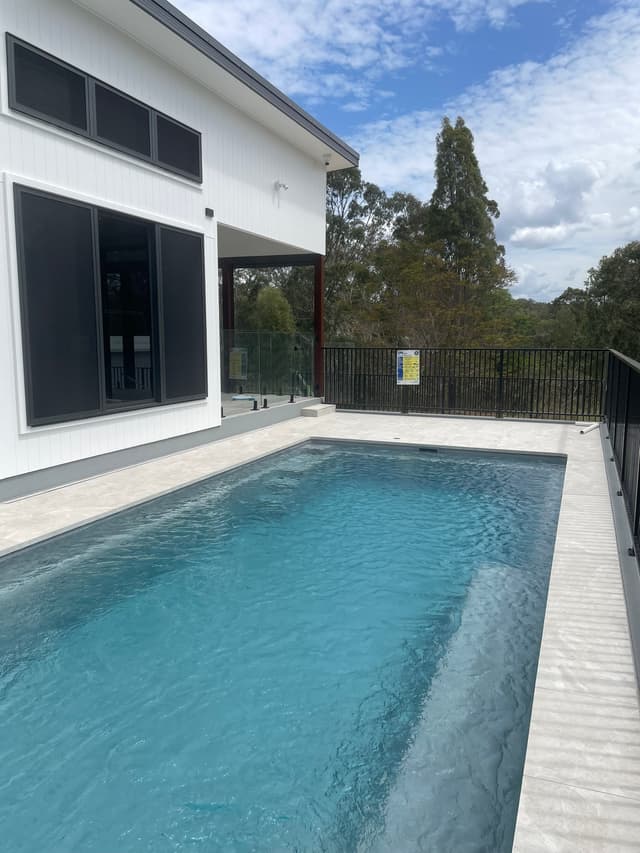 Two-Storey Pool Home - Photo 1
